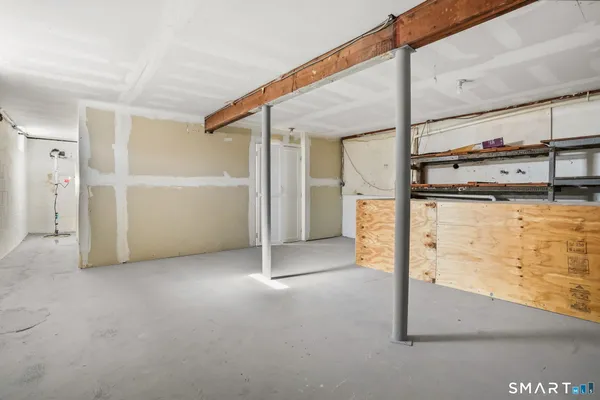 a view of a house with a yard and garage