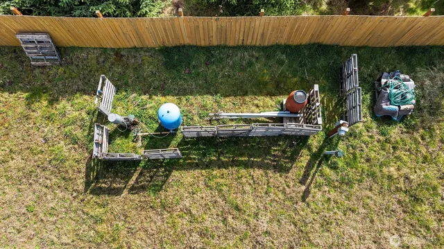 a view of a yard with trees