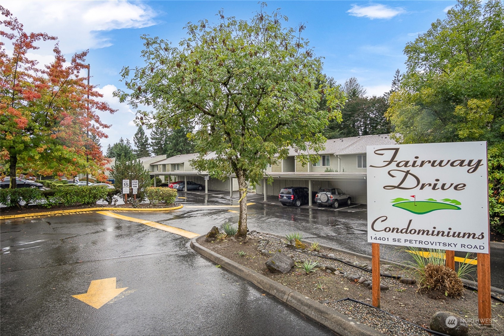 14401 Southeast Petrovitsky Road, Unit E202 Renton, WA 98058 - Photo 1 of 26 an outdoor space with lots of furniture and tree