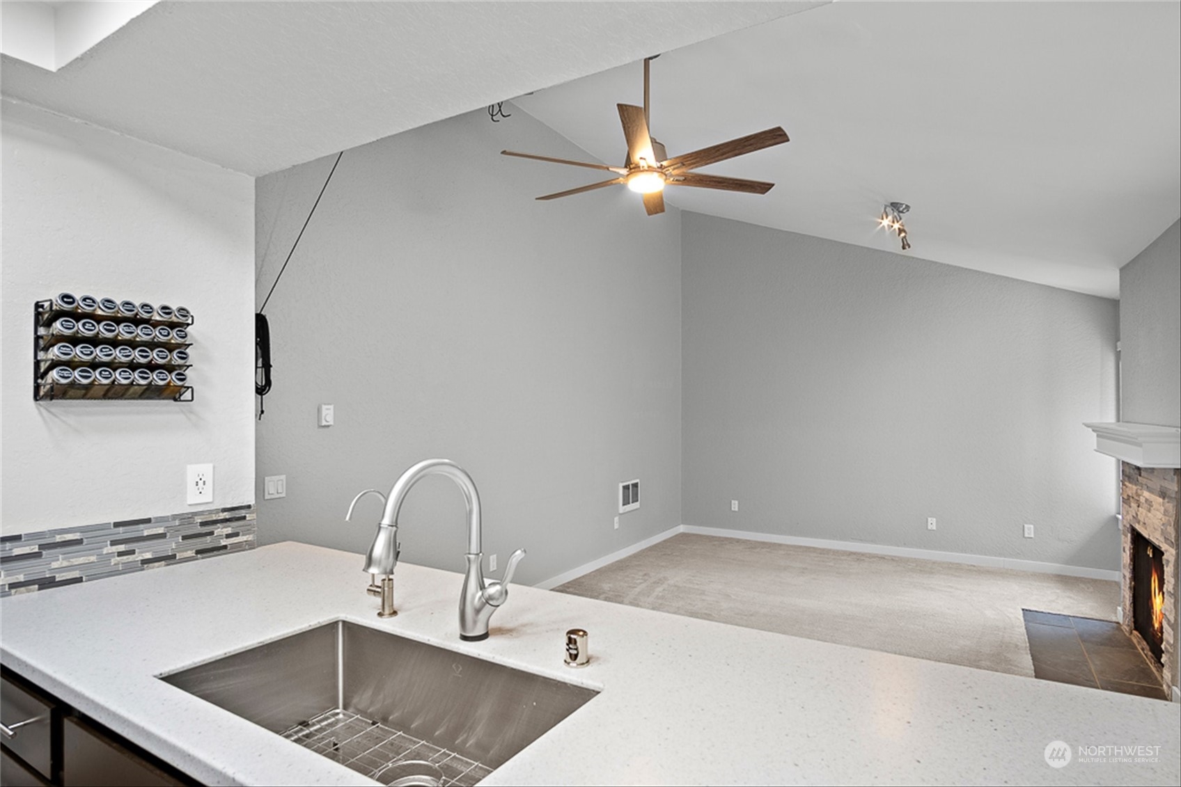 14401 Southeast Petrovitsky Road, Unit E202 Renton, WA 98058 - Photo 17 of 26 a bathroom with a sink and a bathtub
