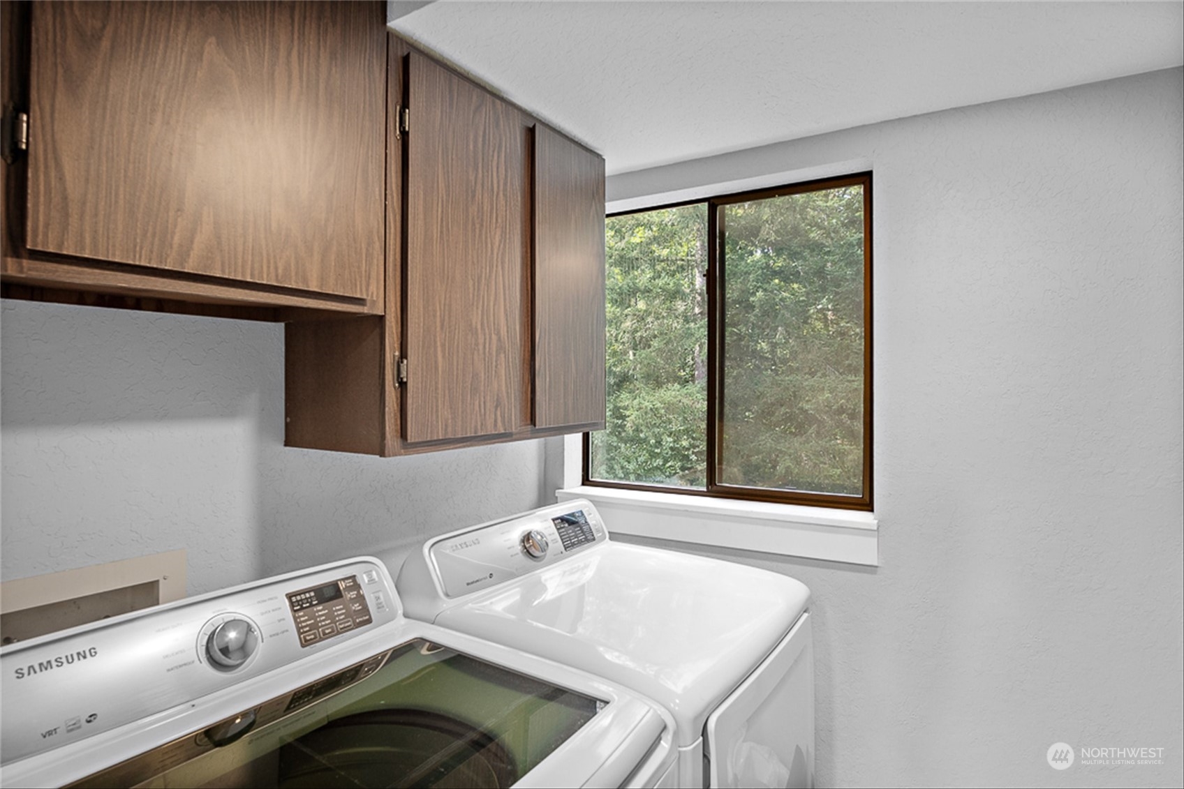 14401 Southeast Petrovitsky Road, Unit E202 Renton, WA 98058 - Photo 18 of 26 a room with storage and utility
