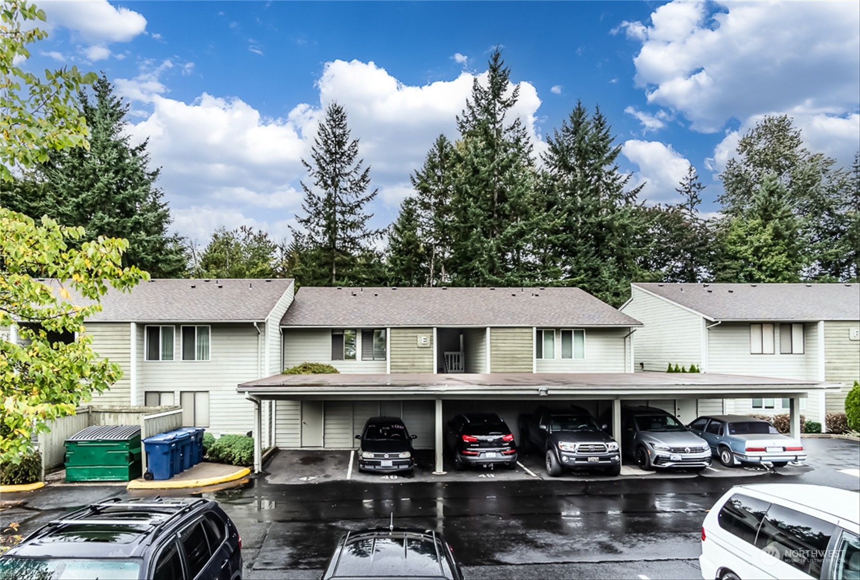 14401 Southeast Petrovitsky Road, Unit E202 Renton, WA 98058 - Photo 2 of 26 a view of a food market with sitting area