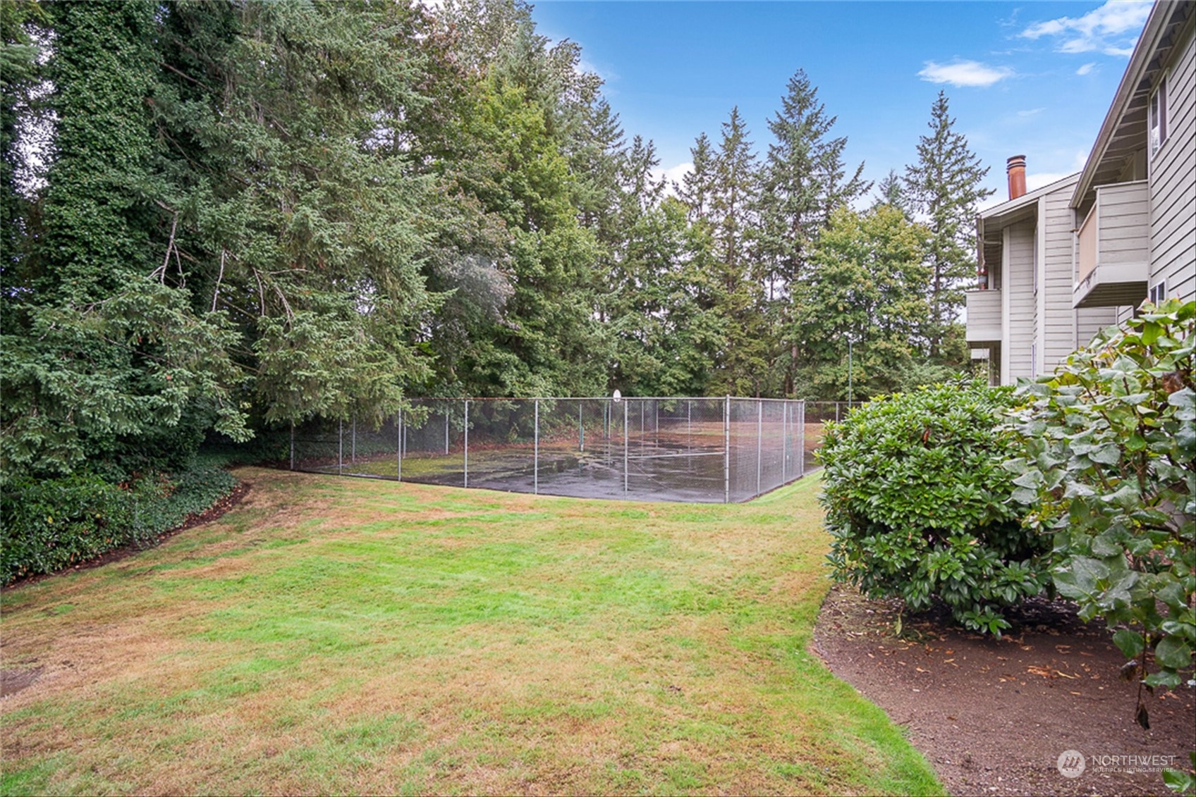 14401 Southeast Petrovitsky Road, Unit E202 Renton, WA 98058 - Photo 25 of 26 a view of a back yard