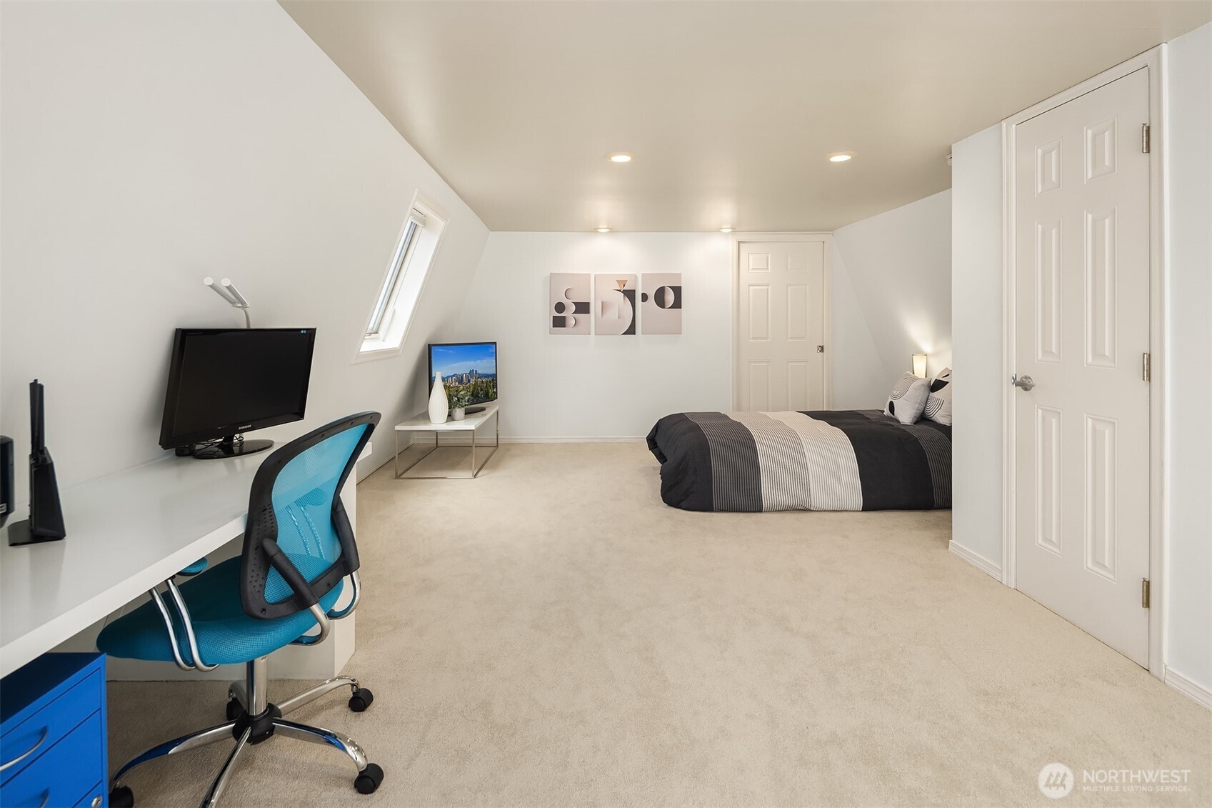 379 100th Avenue Northeast, Unit A Bellevue, WA 98004 - Photo 25 of 38 a workspace with furniture and wooden floor