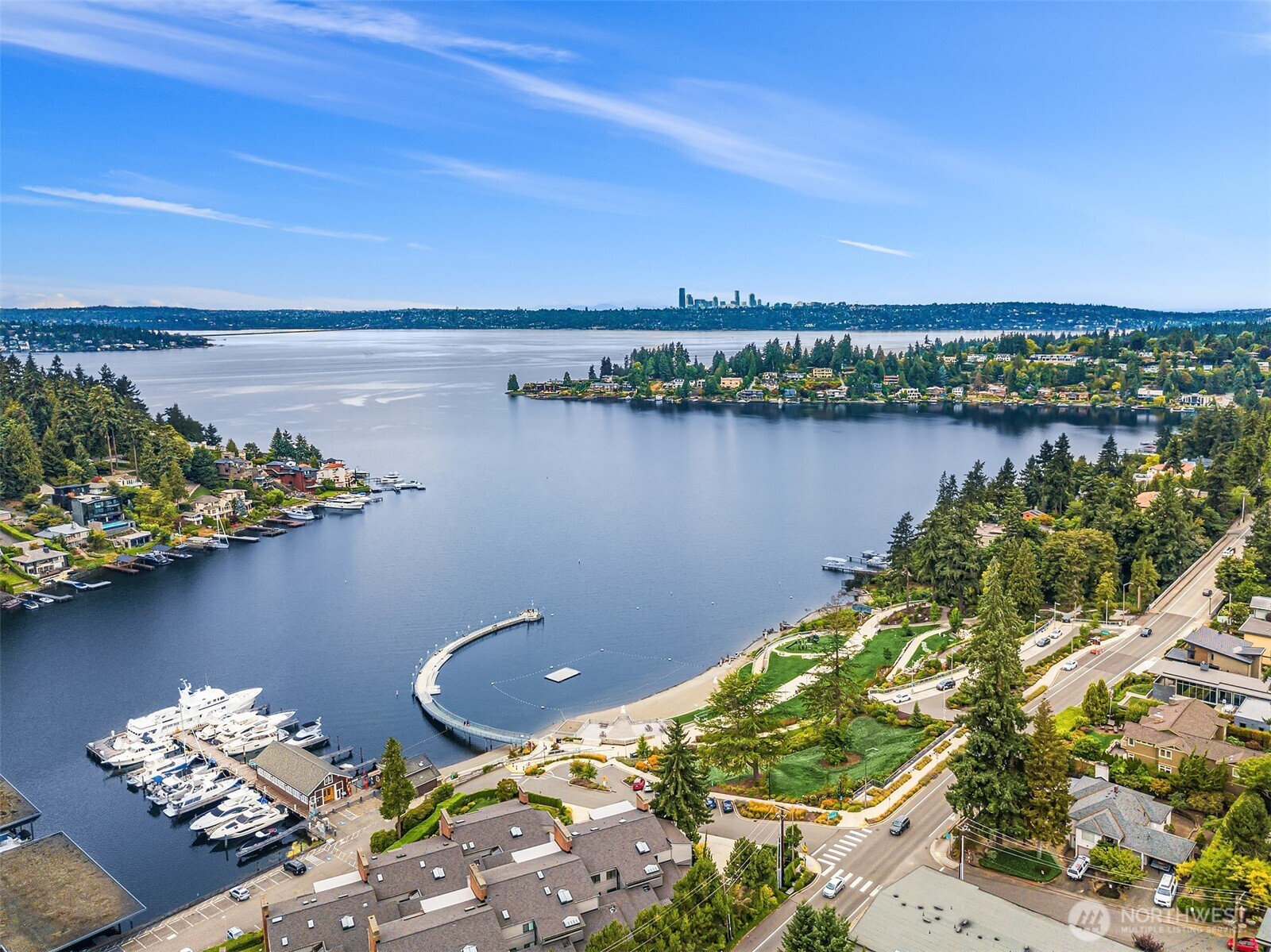379 100th Avenue Northeast, Unit A Bellevue, WA 98004 - Photo 36 of 38 a view of a lake with a mountain in the background