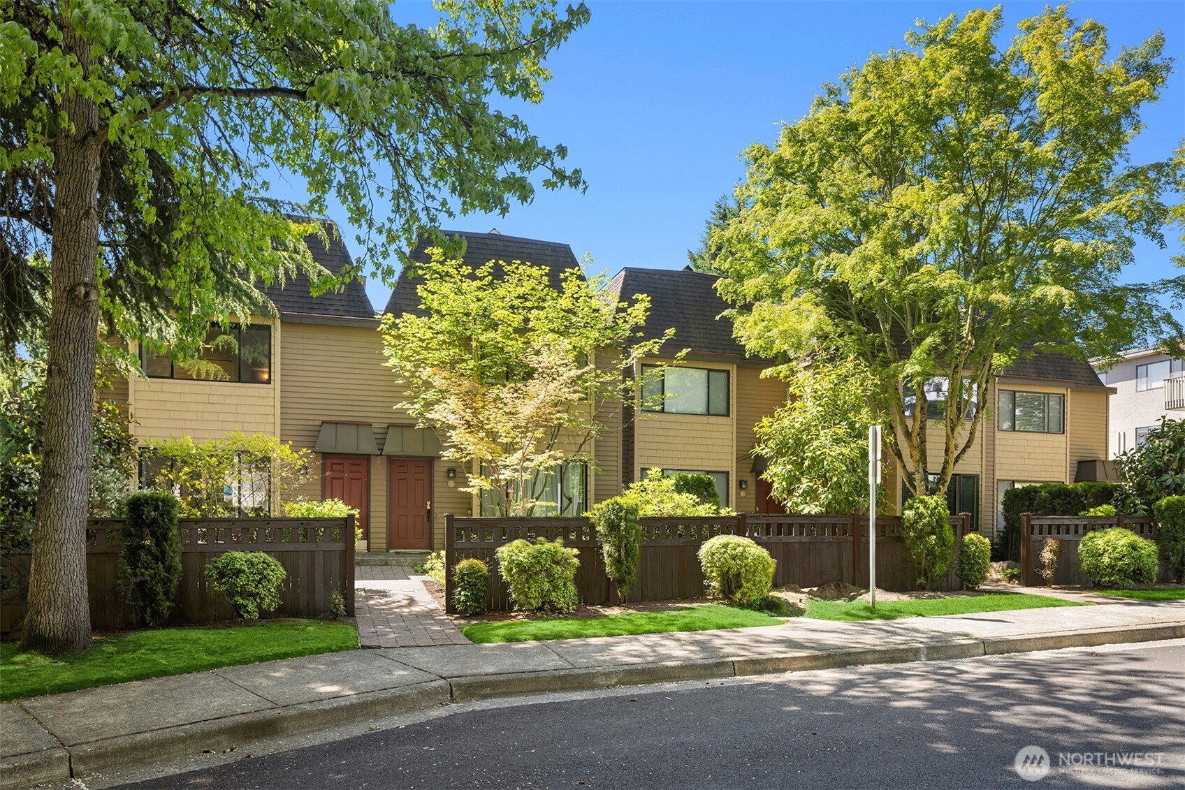 379 100th Avenue Northeast, Unit A Bellevue, WA 98004 - Photo 37 of 38 a view of street with houses