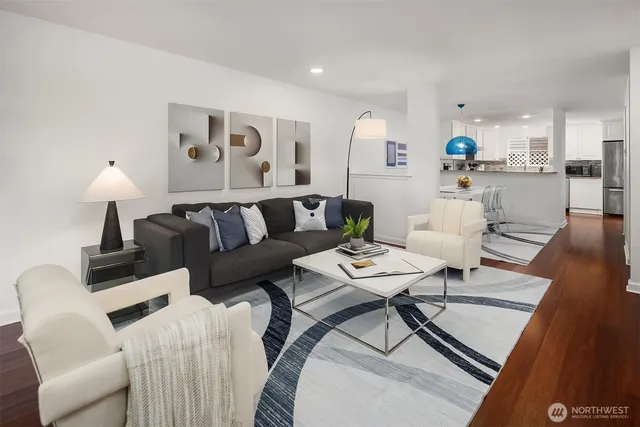 a living room with furniture and a table