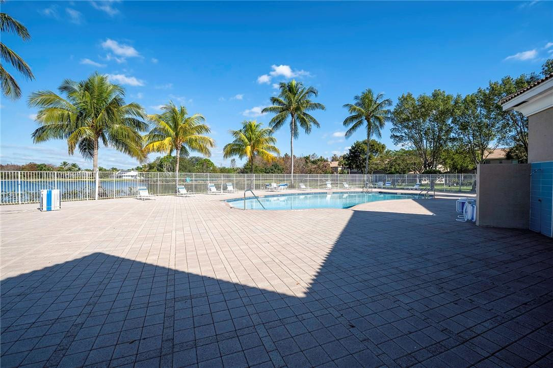 6960 Brook Hollow Road Lake Worth, FL 33467 - Photo 17 of 24 a view of outdoor space with trees
