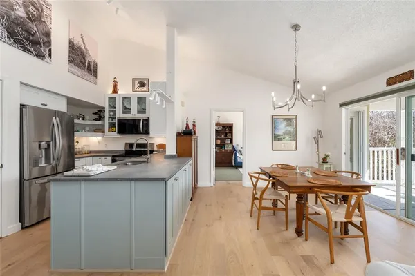 a kitchen with sink cabinets and window