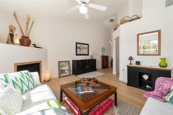 a view of living room with furniture and flat screen tv