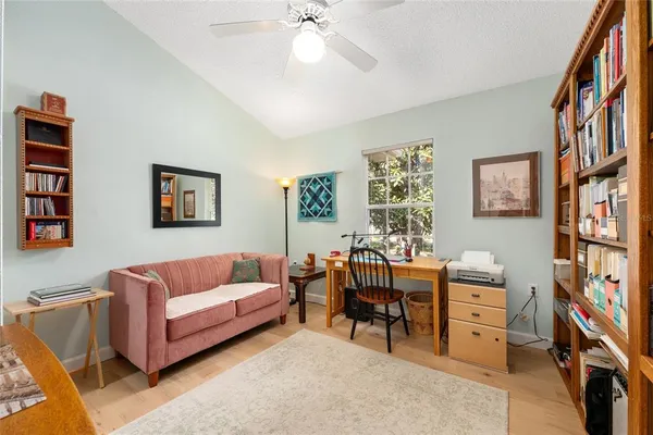 a living room with furniture and a window