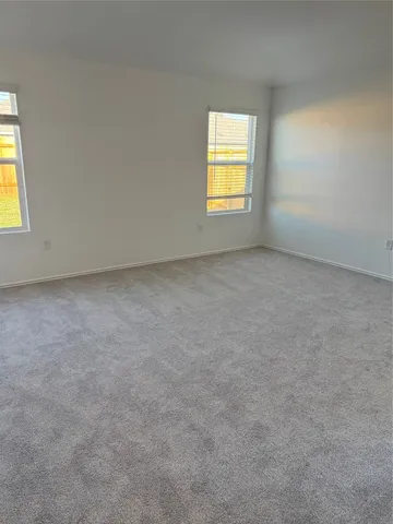 a bathroom with a tub shower and a sink