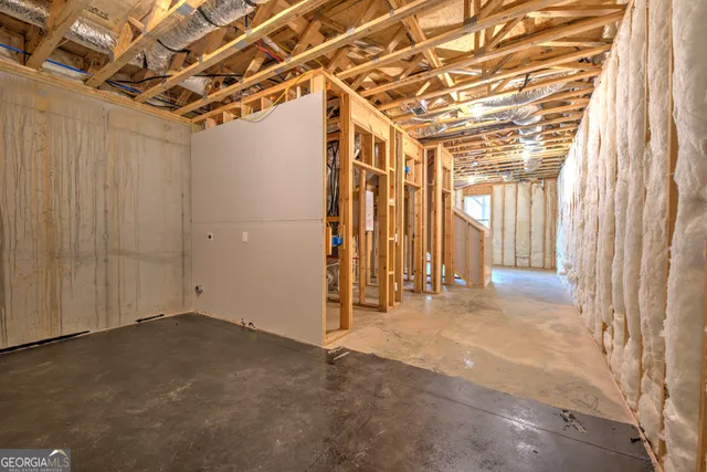 a view of a room with wooden walls