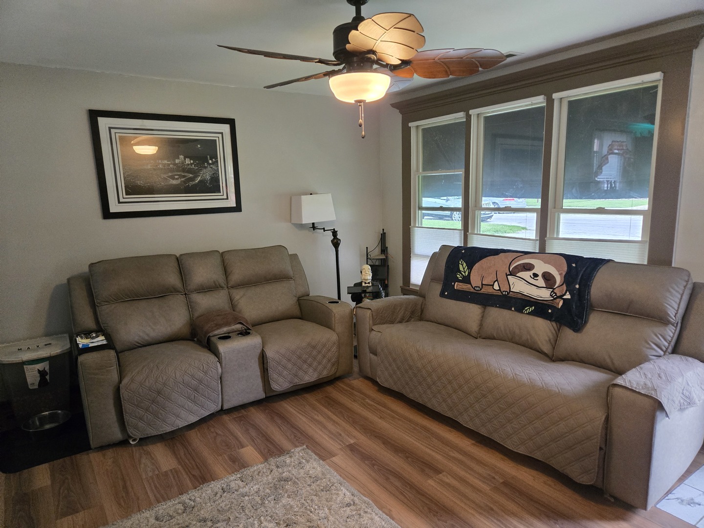 14932 Kedvale Avenue Midlothian, IL 60445 - Photo 2 of 17 a living room with furniture ceiling fan and a window