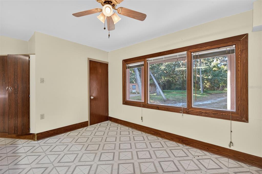 6346 Lost Trail Holiday, FL 34690 - Photo 17 of 55 a view of an empty room with a window