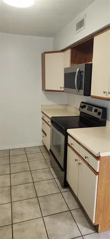 a view of kitchen with washer and dryer