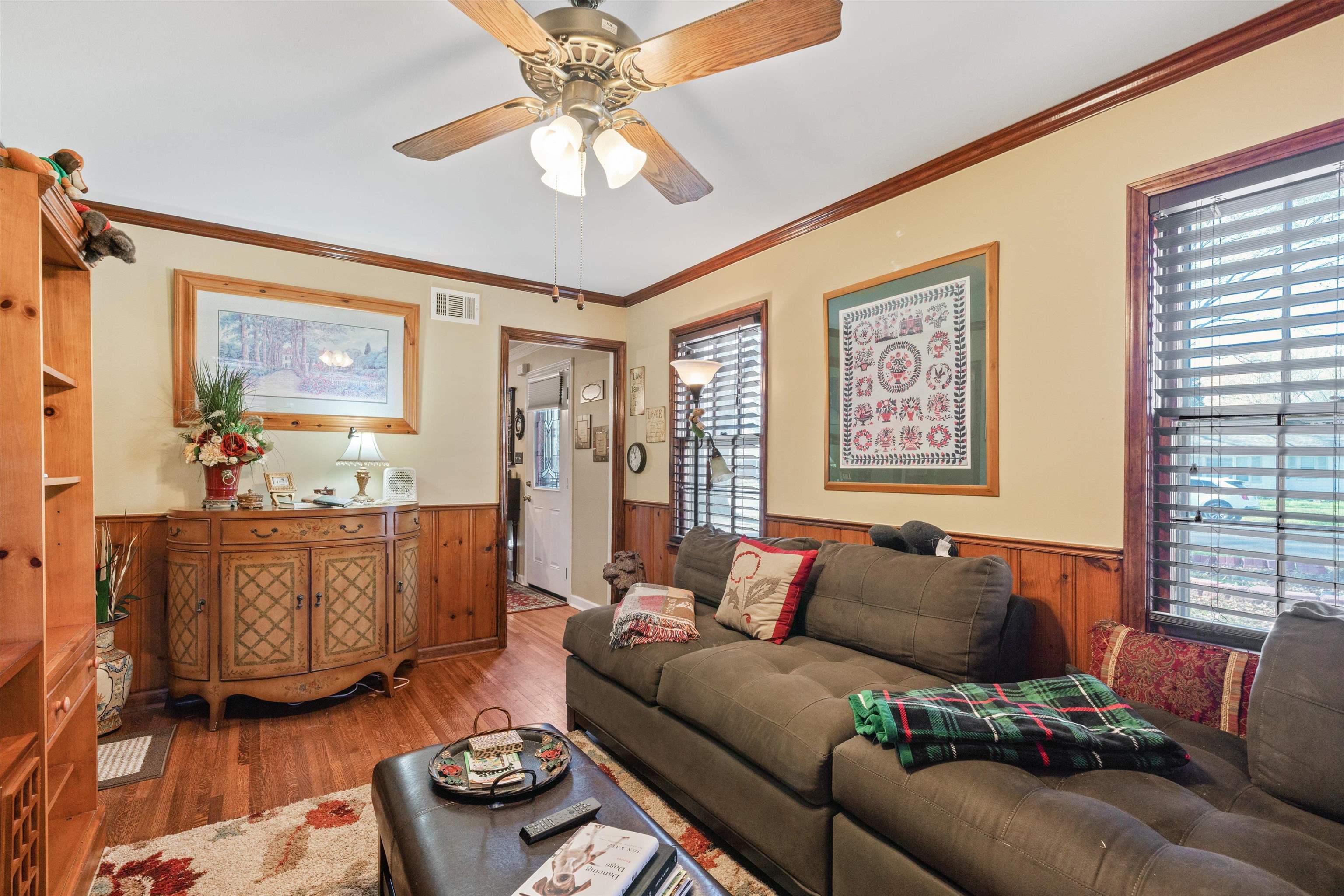 5100 Helene Road Memphis, TN 38117 - Photo 4 of 25 a living room with furniture and a chandelier