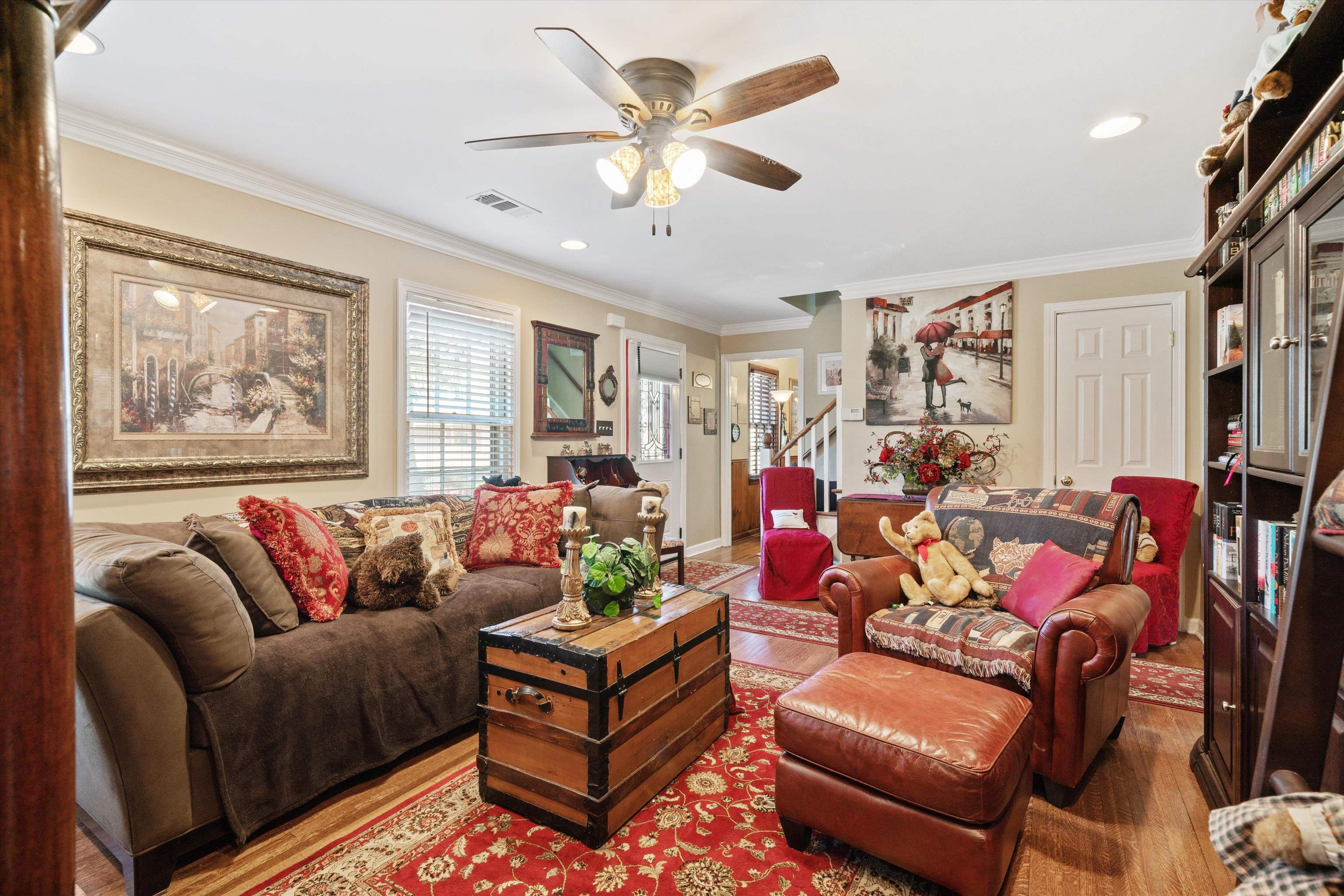 5100 Helene Road Memphis, TN 38117 - Photo 7 of 25 a living room with furniture ceiling fan and a rug