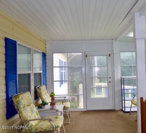 213 Shore Road Newport, NC 28570 - Photo 4 of 19 Glassed in front porch