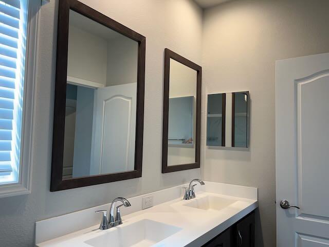 116 A Street, Unit 116 Concord, CA 94520 - Photo 9 of 11 a bathroom with 2 sink and a mirror