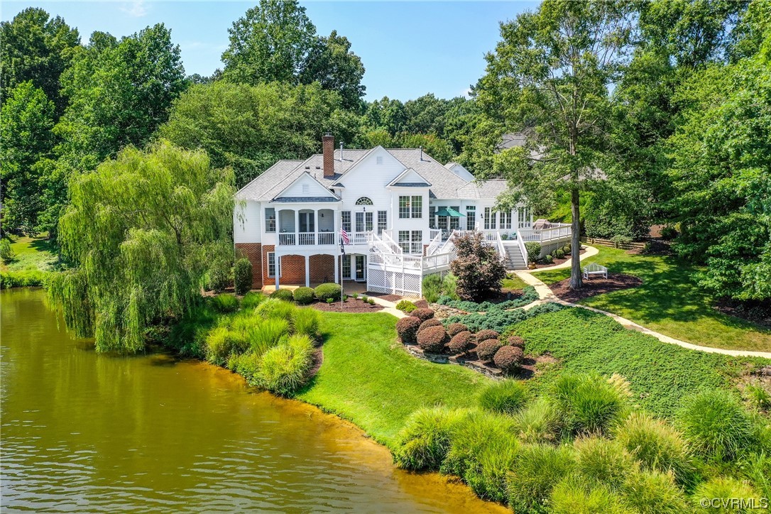 104 Longboat Williamsburg, VA 23188 - Photo 1 of 50 a front view of a house with swimming pool