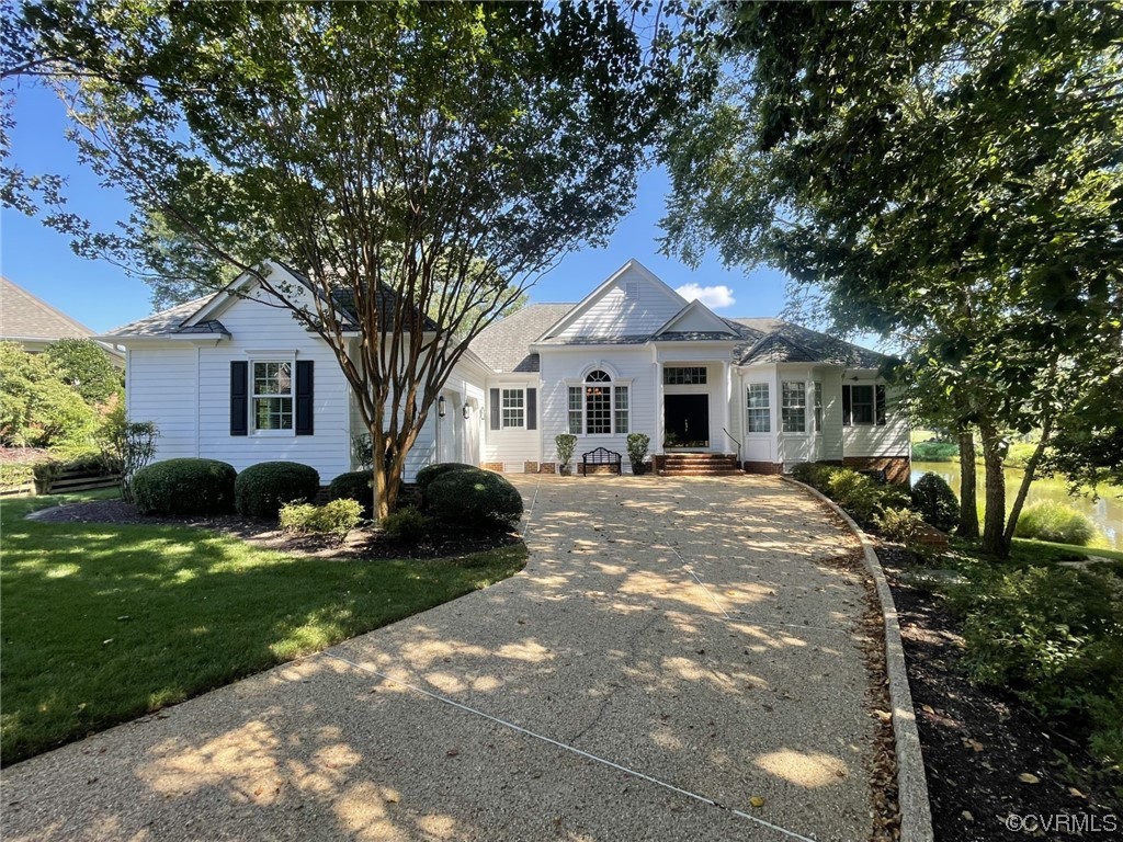 104 Longboat Williamsburg, VA 23188 - Photo 2 of 50 a front view of a house with a yard