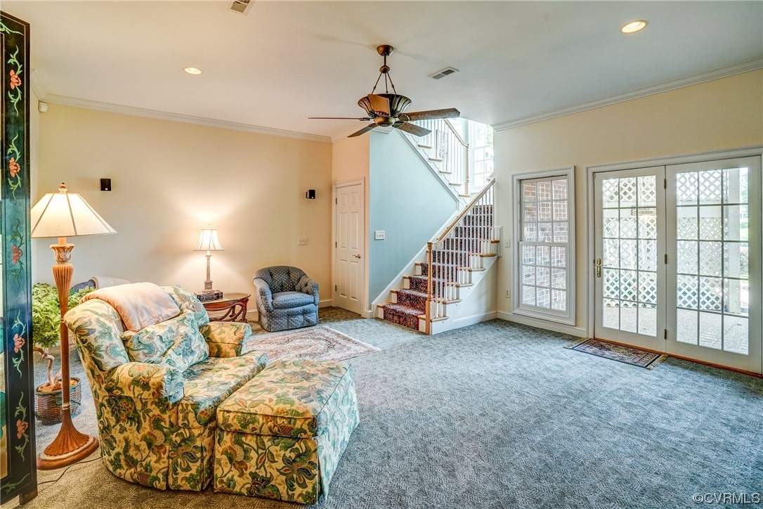104 Longboat Williamsburg, VA 23188 - Photo 28 of 50 a living room with furniture and a ceiling fan