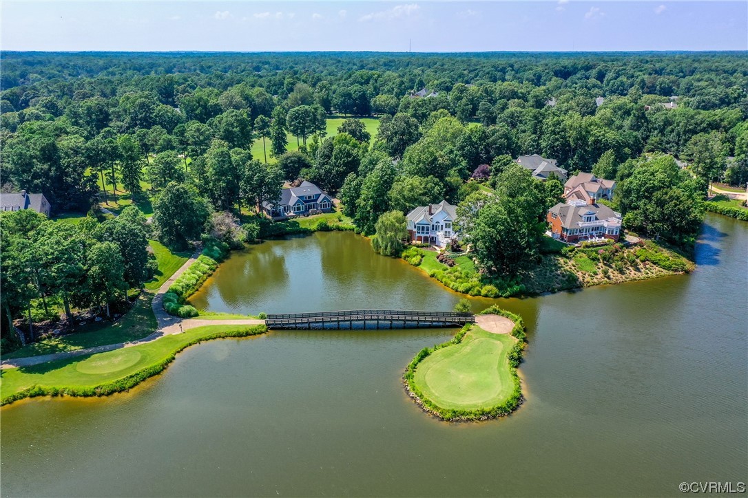 104 Longboat Williamsburg, VA 23188 - Photo 3 of 50 a view of a table and chairs in the garden