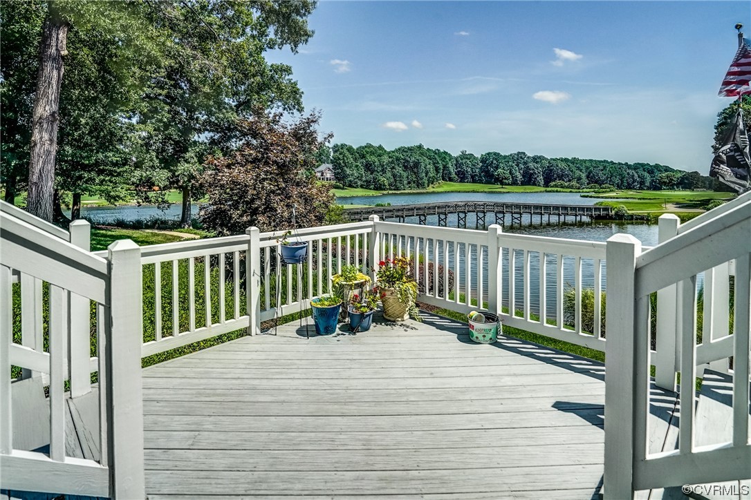 104 Longboat Williamsburg, VA 23188 - Photo 36 of 50 a view of balcony with wooden floor and fence