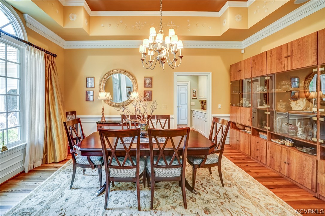 104 Longboat Williamsburg, VA 23188 - Photo 6 of 50 a view of a dining room with furniture and chandelier