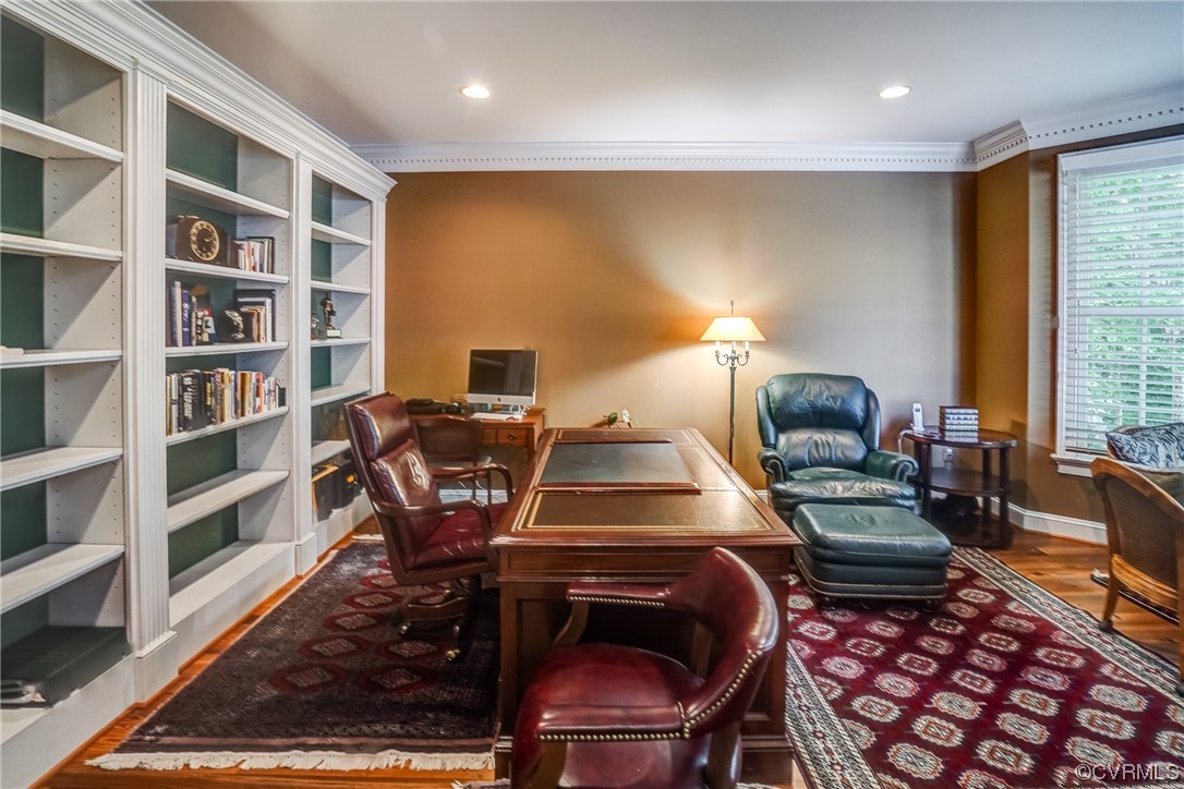 104 Longboat Williamsburg, VA 23188 - Photo 7 of 50 a bedroom with furniture and a book shelf