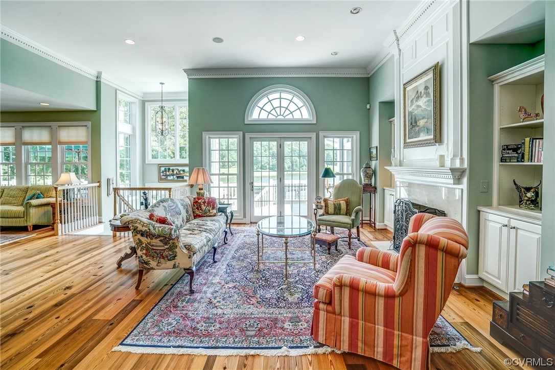 104 Longboat Williamsburg, VA 23188 - Photo 9 of 50 a living room with fireplace furniture and a large window