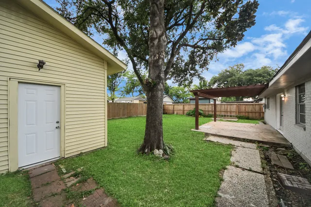 a view of a backyard with a garden