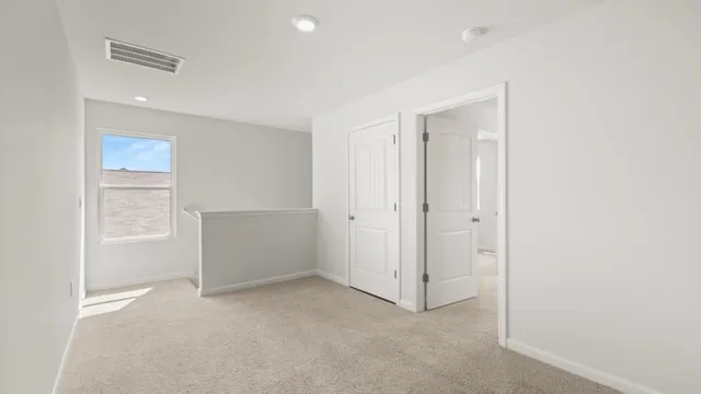 an empty room with windows