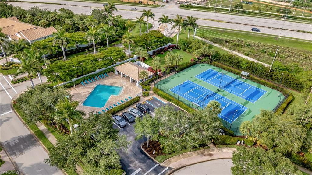 15995 Caldera Lane, Unit 69 Naples, FL 34110 - Photo 24 of 27 Bird's eye view of a pool area