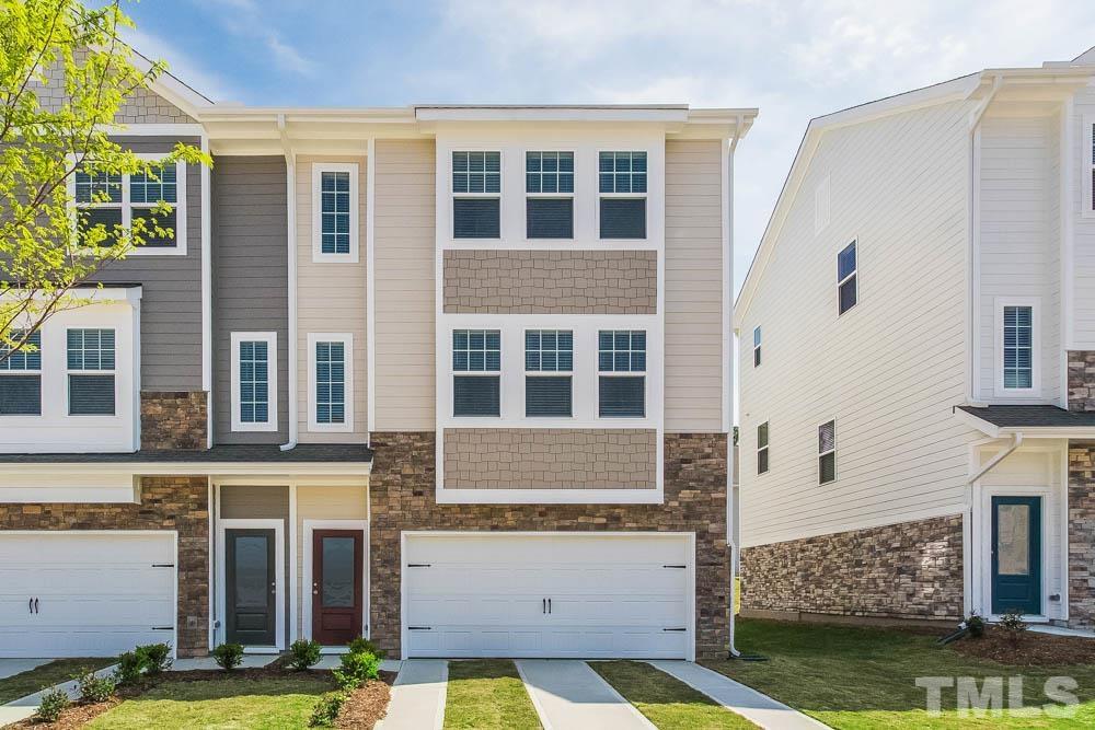 6913 Point Bar Place Raleigh, NC 27616 - Photo 1 of 23 front view of a house with a yard