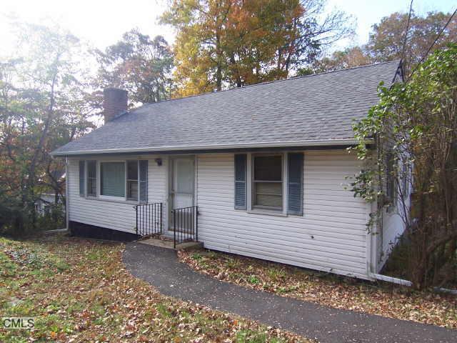 440 Bennetts Farm Road Ridgefield, CT 06877 - Photo 1 of 1 a view of a house with a yard