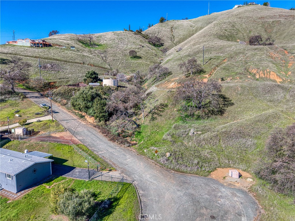 7780 Verna Way Lucerne, CA 95458 - Photo 10 of 28 a view of a backyard of the house