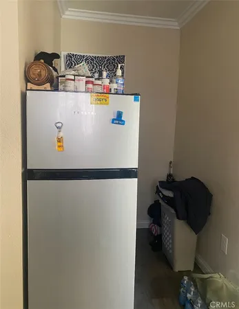a view of washer and dryer with kitchen countertops
