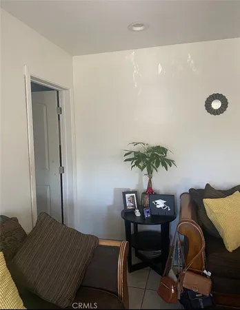 a bedroom with a bed and a table