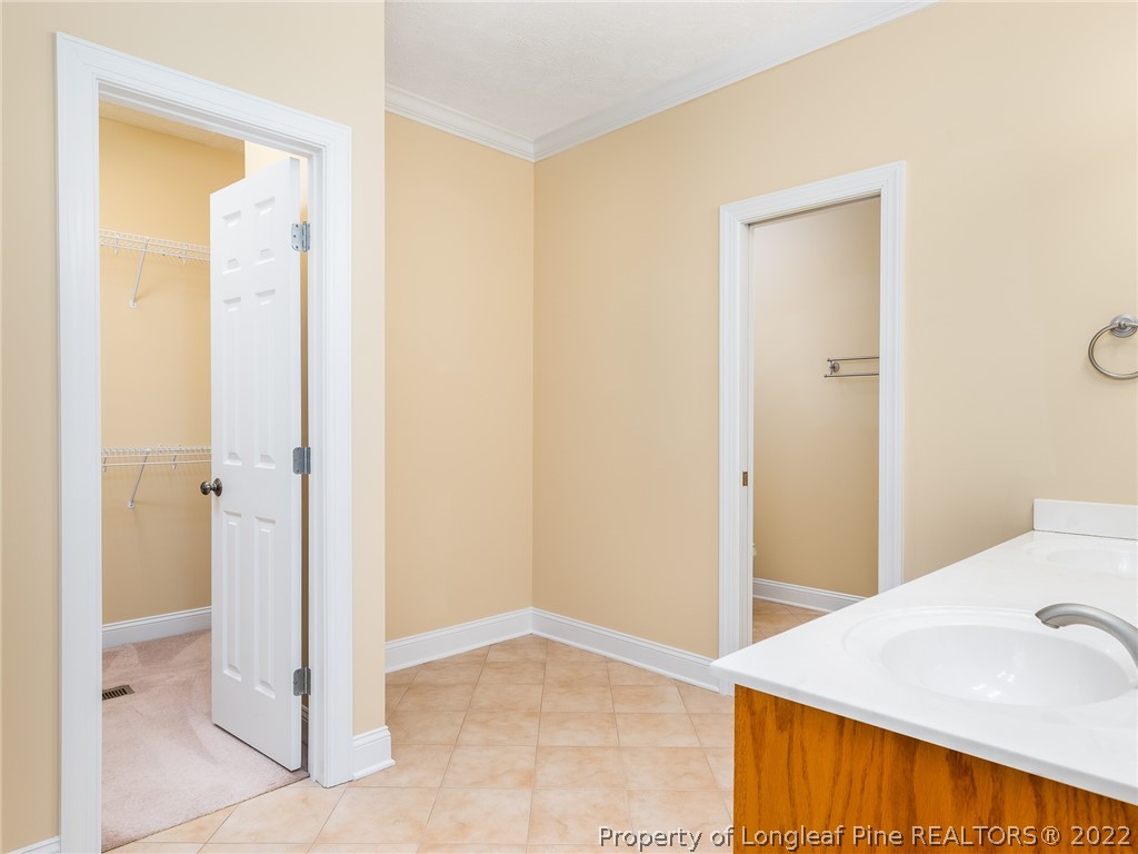 119 Myra Road Raeford, NC 28376 - Photo 26 of 43 a view of a bathroom from a hallway
