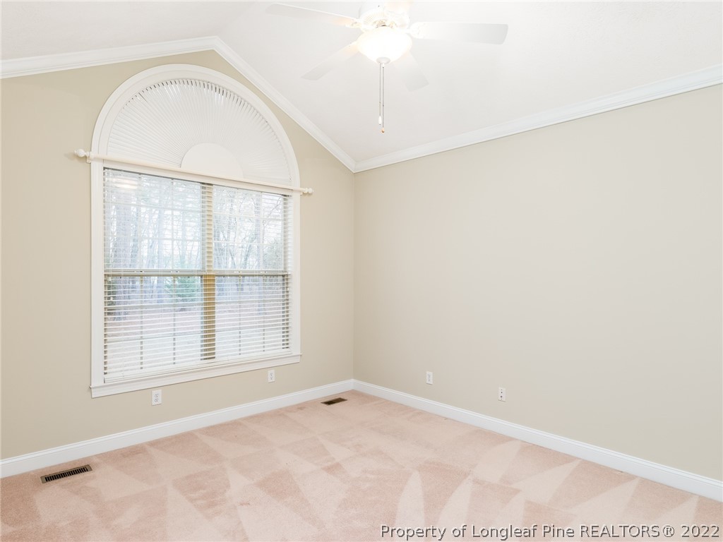 119 Myra Road Raeford, NC 28376 - Photo 32 of 43 an empty room with a empty space and windows