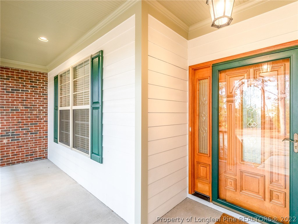 119 Myra Road Raeford, NC 28376 - Photo 10 of 43 a view of an empty room with a window