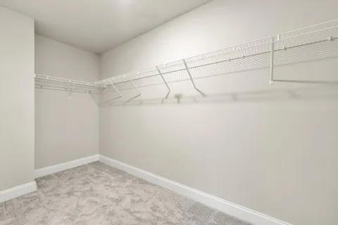 a view of a room with racks on the wall