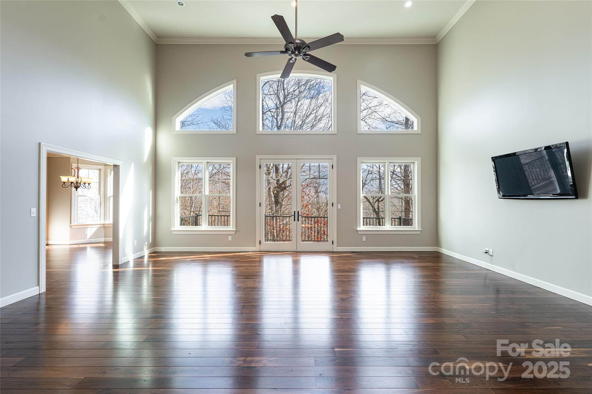 98 Sovereign Lane Fairview, NC 28730 - Photo 7 of 42 a view of an entryway with wooden floor
