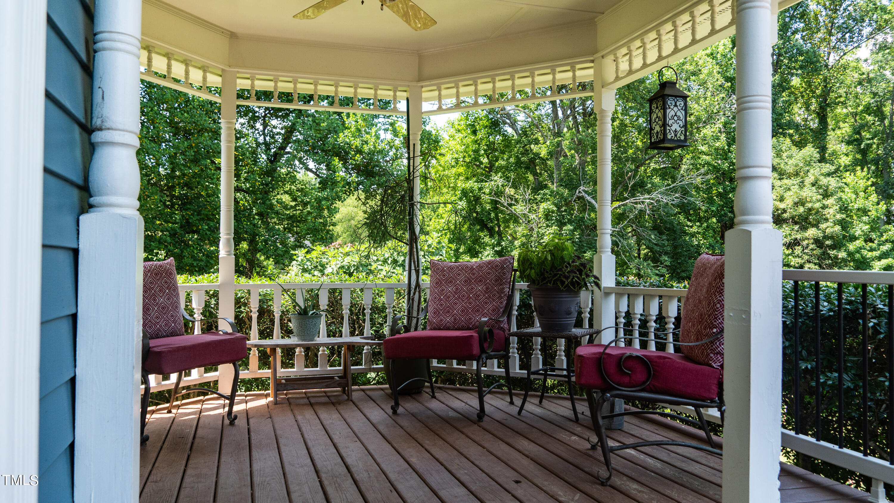 928 Windrow Lane Raleigh, NC 27603 - Photo 11 of 47 a view of a chairs and table in patio with a yard