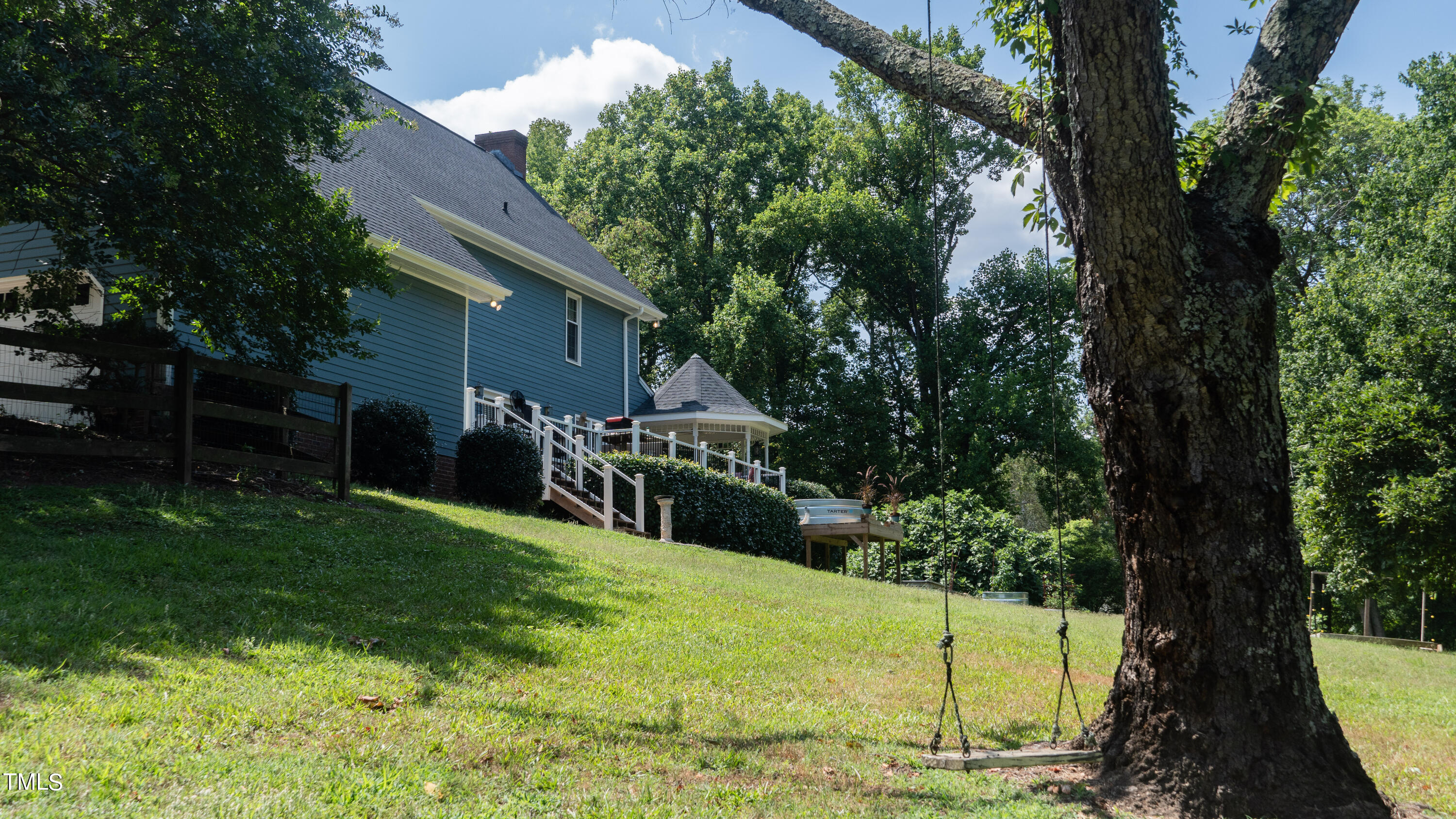 928 Windrow Lane Raleigh, NC 27603 - Photo 12 of 47 a view of yard with green space