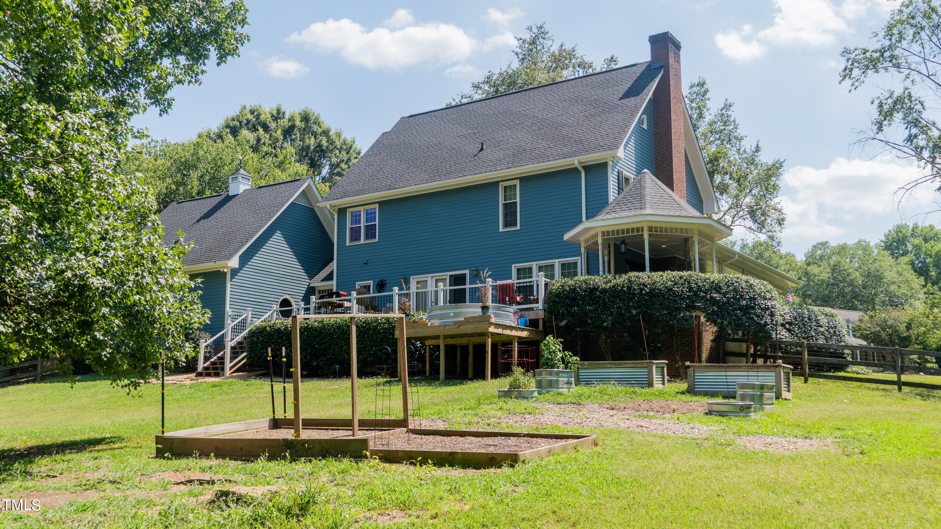 928 Windrow Lane Raleigh, NC 27603 - Photo 14 of 47 a view of a house with swimming pool and porch