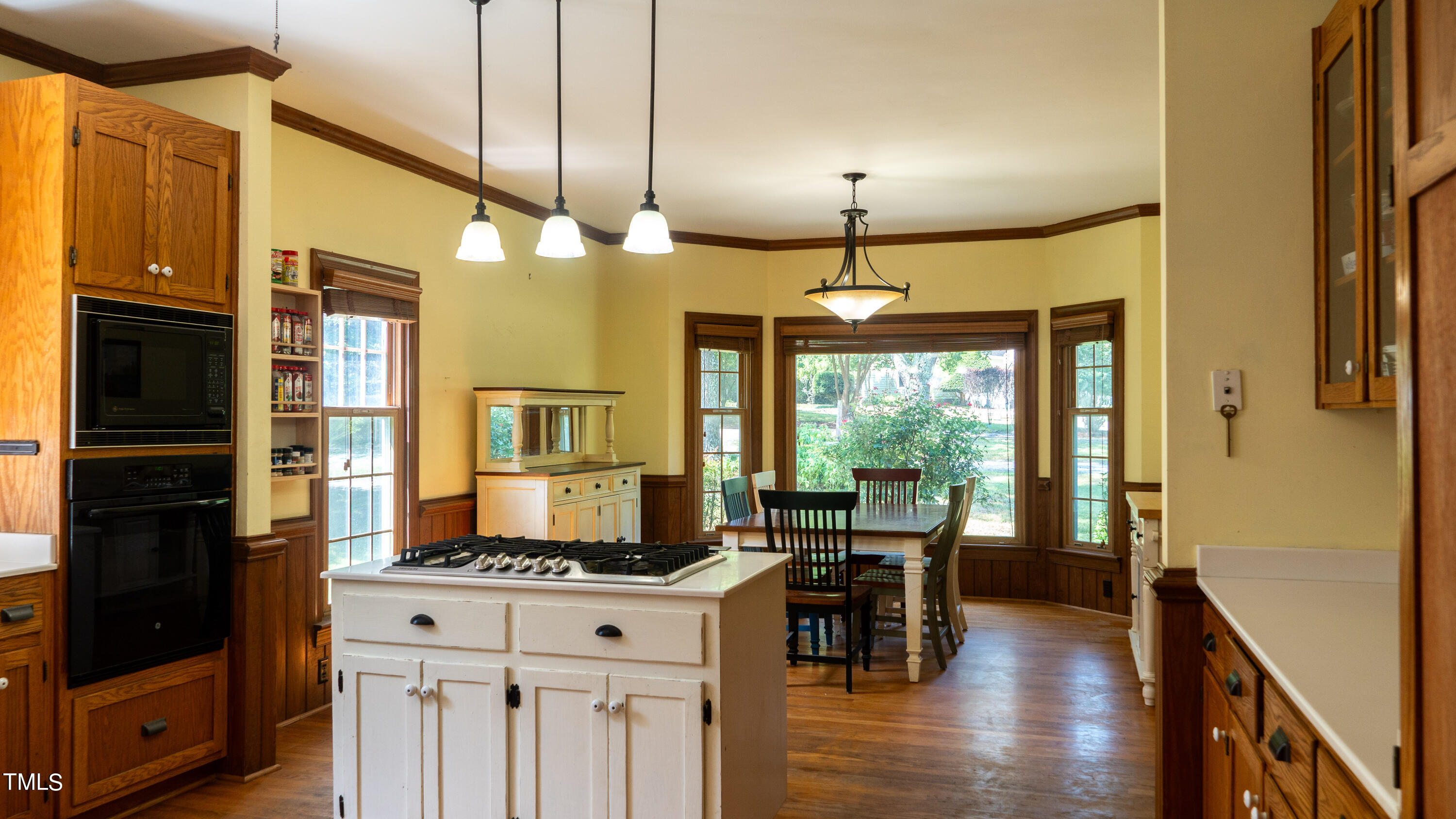 928 Windrow Lane Raleigh, NC 27603 - Photo 16 of 47 a kitchen with stainless steel appliances granite countertop a stove and a refrigerator
