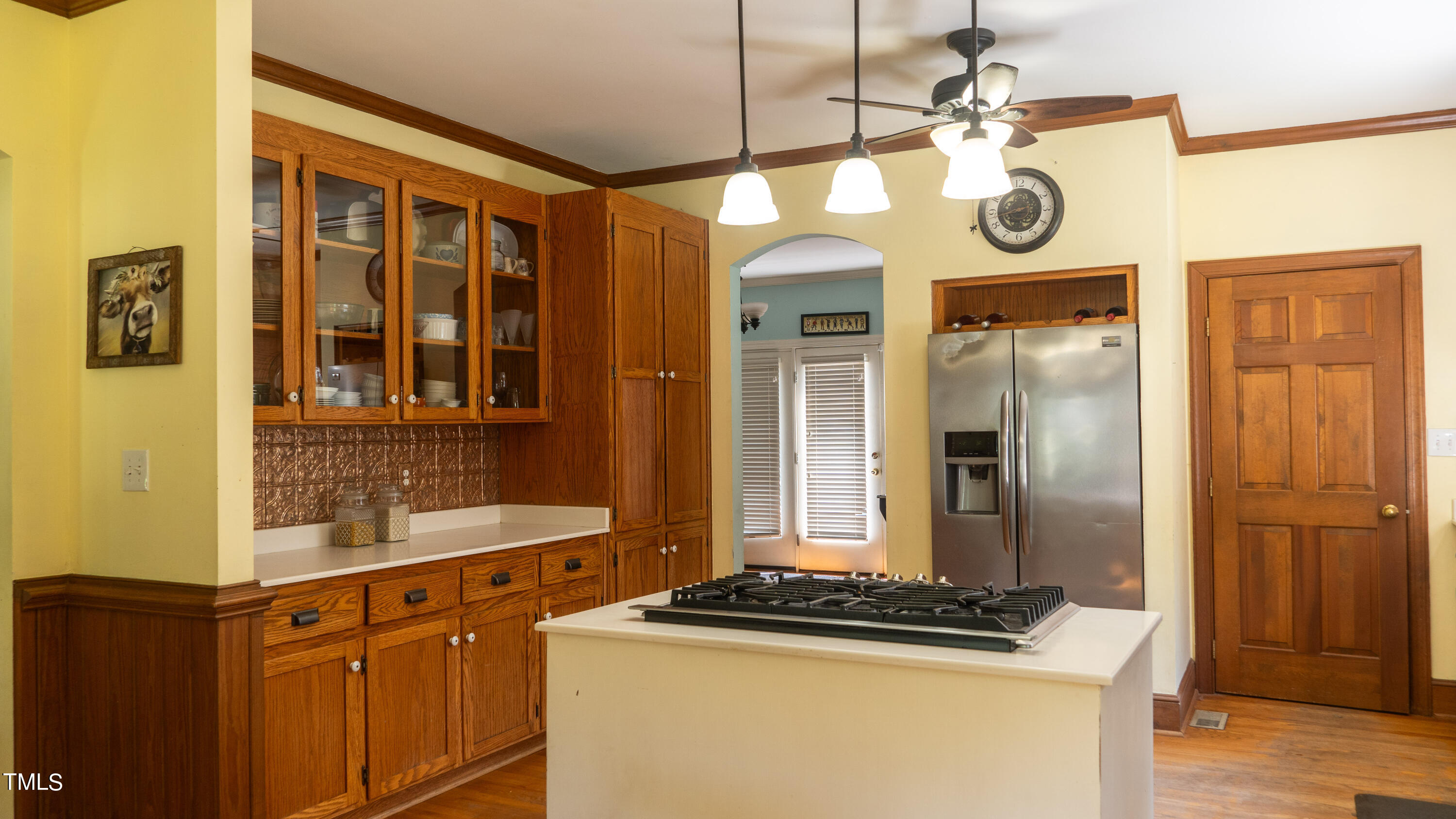 928 Windrow Lane Raleigh, NC 27603 - Photo 19 of 47 a kitchen with stainless steel appliances granite countertop a stove and a refrigerator